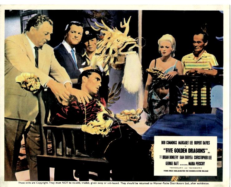 Cinema Lobby Card: FIVE GOLDEN DRAGONS 1967 (UK Dead In Chair) Cinema Lobby Card: FIVE GOLDEN DRAGONS 1967 (UK Dead In Chair)