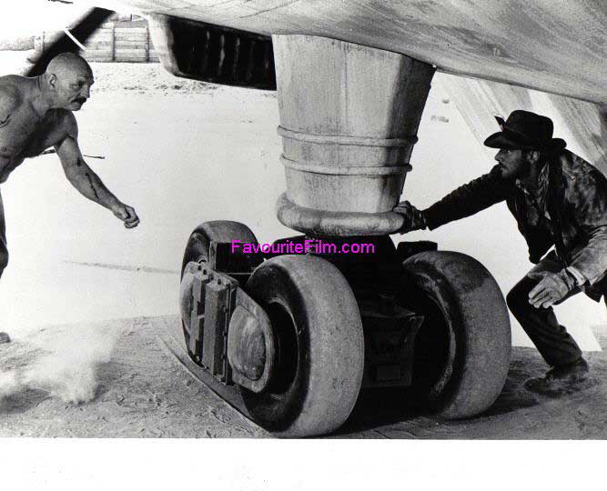 RAIDERS OF THE LOST ARK: B/W Still Indiana Jones & German Mechanic RAIDERS OF THE LOST ARK: B/W Still Indiana Jones & German Mechanic