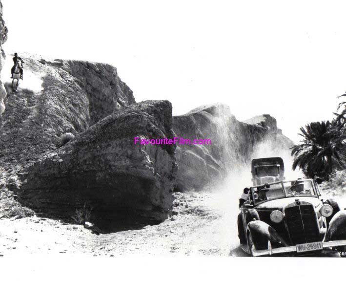 RAIDERS OF THE LOST ARK: B/W Still Indy Chases Down Slope RAIDERS OF THE LOST ARK: B/W Still Indy Chases Down Slope