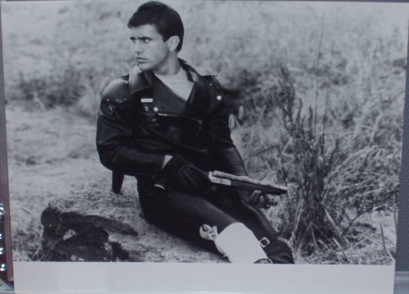 MAD MAX: B/W Still - Max Sits MAD MAX: B/W Still - Max Sits